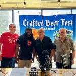 Marc Roland & Jim Seeks talk to crafted Beerfest podcast standing in front the crafted podcast banner